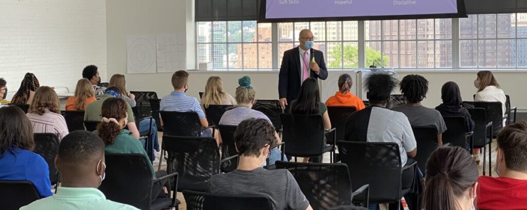 Justin Aglio presenting at the Summer Program
