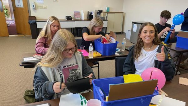 Summer Program learners complete a TEAMology classroom activity using balloons