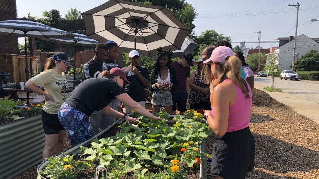 Emma and students at Sunny's Garden