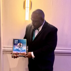 Fred with 40 under 40 plaque