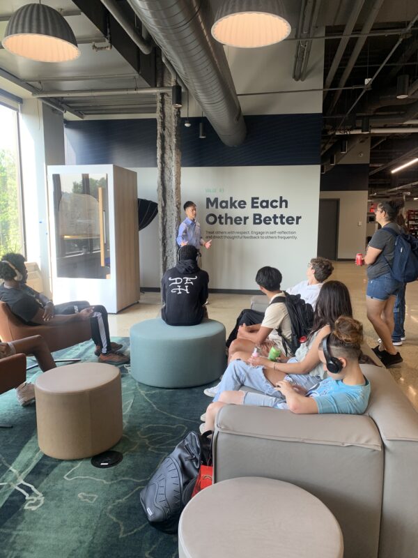 students listening to leader at Gecko Robotics