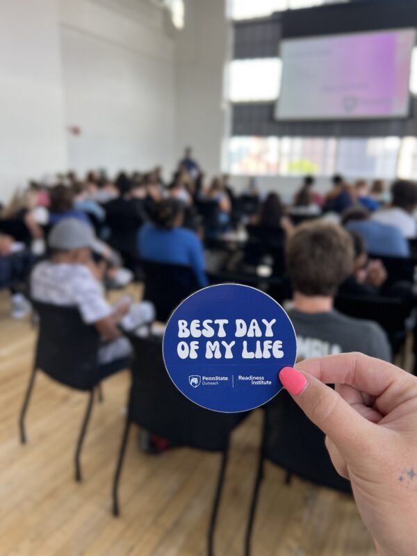 best day of my life sticker with blurred students in background