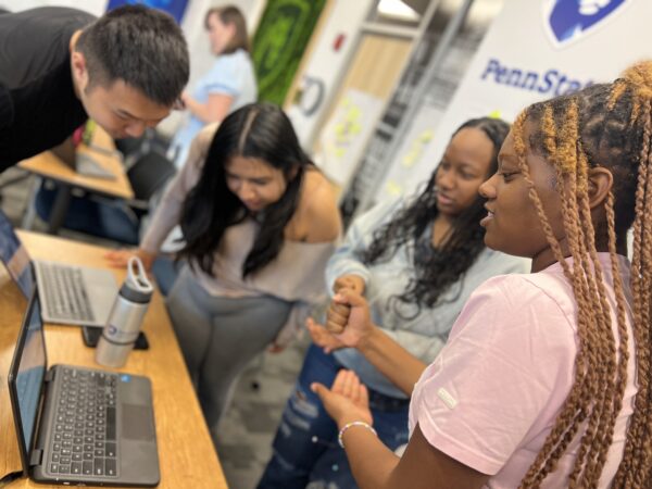 Learners in a Pittsburgh cohort of the Summer Program take part in an AI workshop