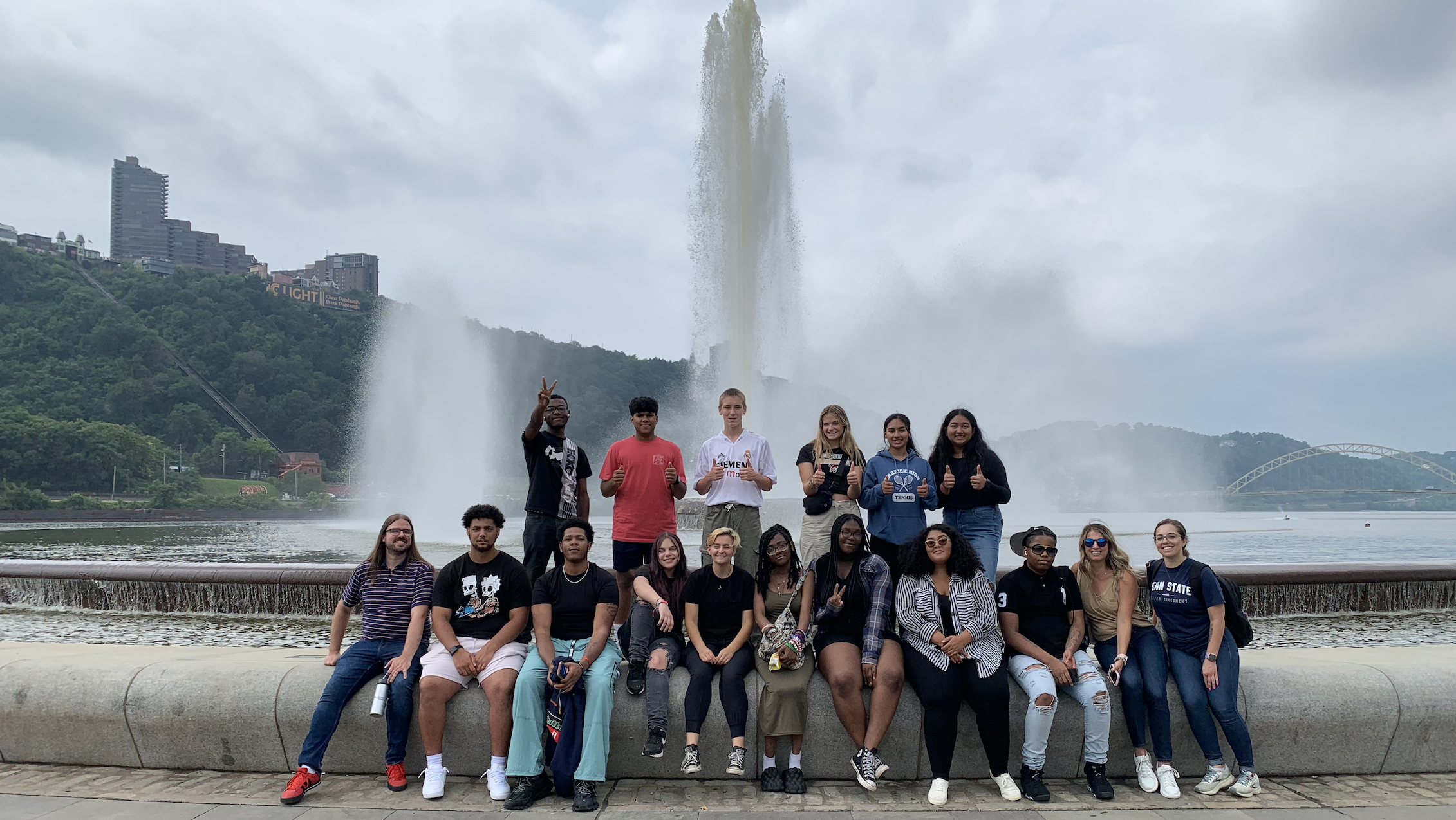 Summer Program learners pose in front of a fountain at Point State Park.
