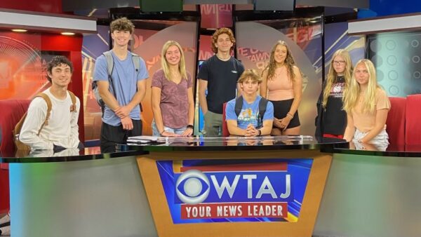 Summer Discovery students at a WTAJ news desk